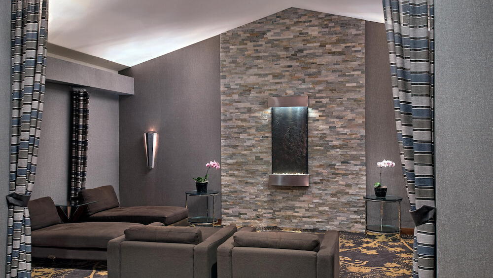 One part of a beautiful Chicago Northwest resort, the Spa at Eaglewood features a zen relaxation room with water fountain, a 25-meter indoor pool, an indoor hot tub, and light, complimentary refreshments for guests receiving services.