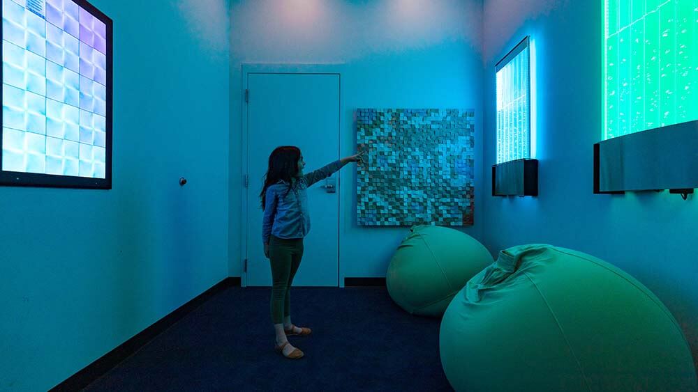child plays in sensory room