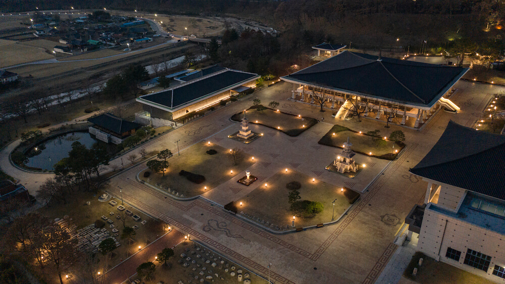 An overhead view of a Korean temple complex at night