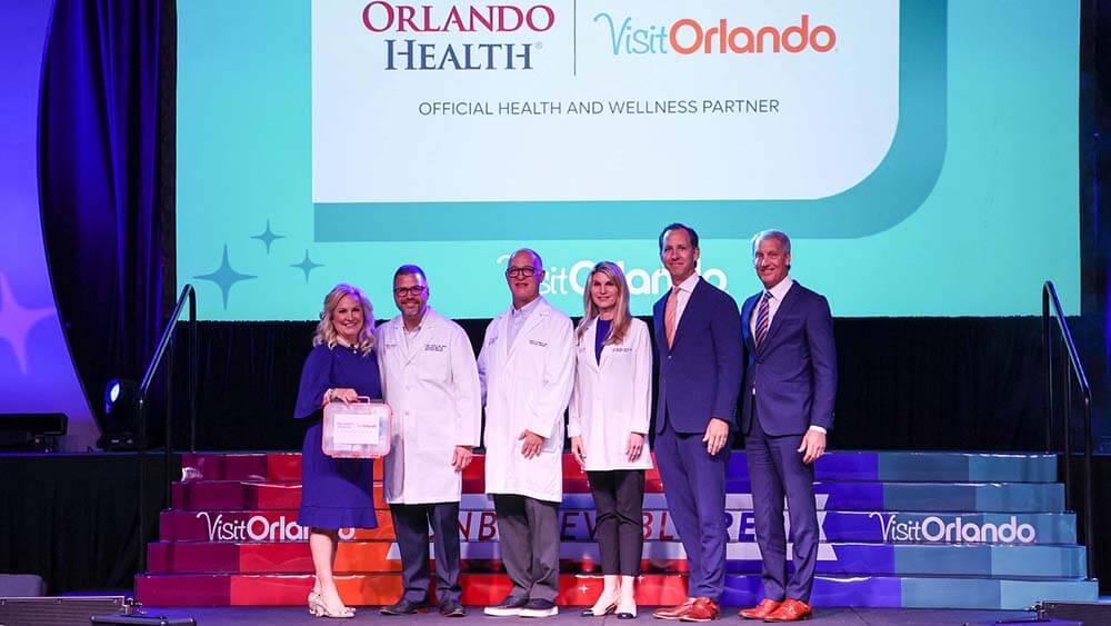 people on stage for an announcement