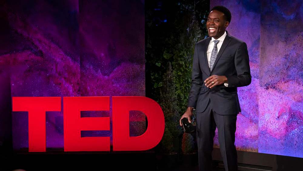 video game profession Kris Alexander delivering TED Talk