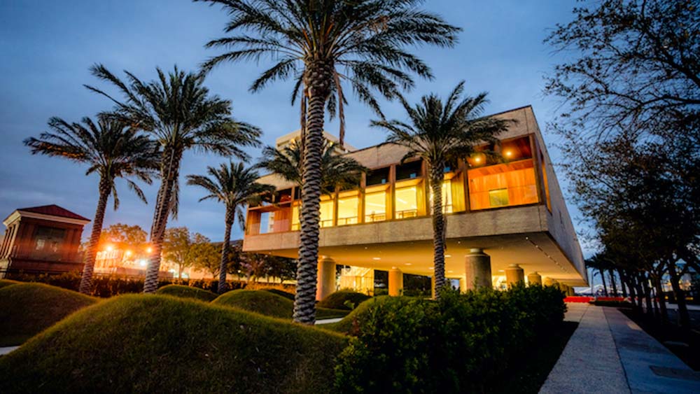 lighted exterior of museum at night