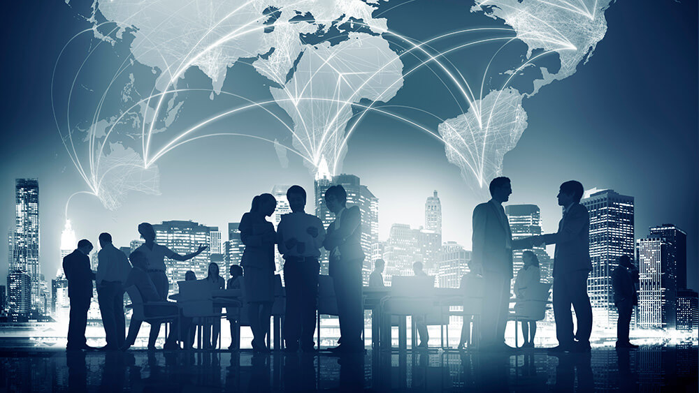 business people in silhouettes with global map background