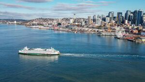 ferry crossing sound with cityscape in background