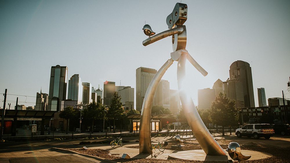 “The Traveling Man” statue walks tall in Deep Ellum — an arts and entertainment hub near downtown Dallas.