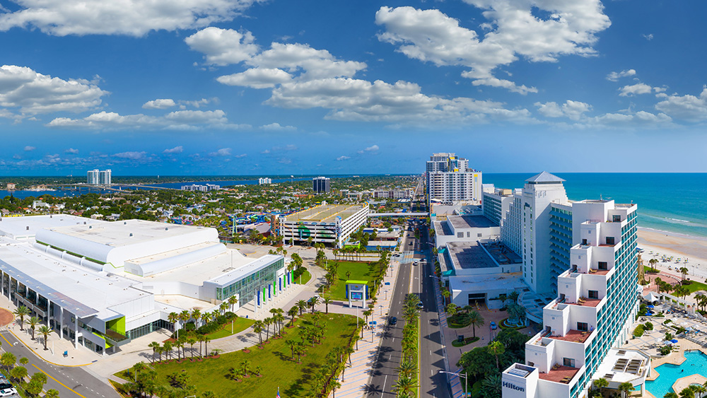 aerial view of beach, ocean, buildings