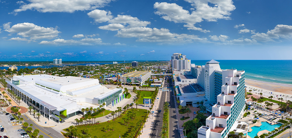 aerial view of beach, ocean, buildings