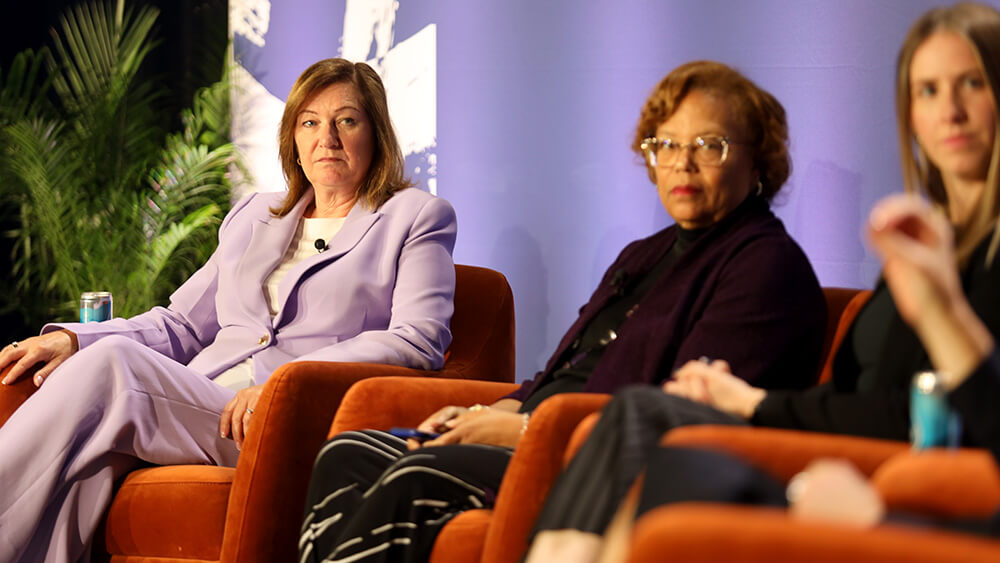 women on stage in panel