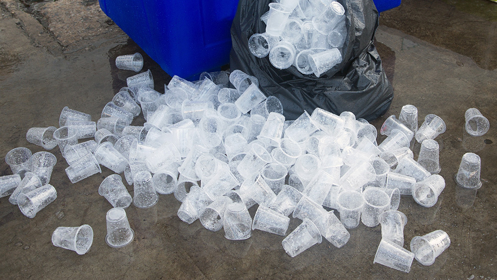 plastic cups piled on floor