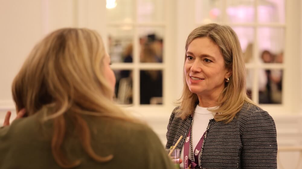 Incoming Board chair Kelly Ricker chats with a participant at Convening Leaders 2026. Photo by Jacob Slaton / Whatever Media Group