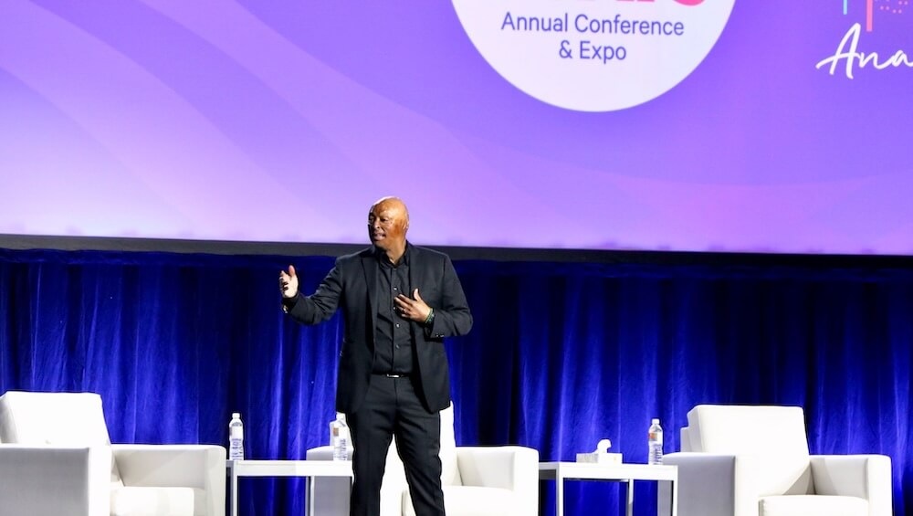 As he spoke onstage at AOTA's 2026 annual meeting, J.R. Martinez was surprised onstage by Kim, who had been his occupational therapist.