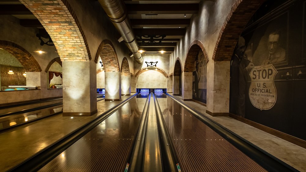 Omni Louisville Hotel’s event spaces are anything but typical — think a speakeasy with bowling lanes, a marketplace packed with local vendors, and a library-inspired lounge with a fireplace.