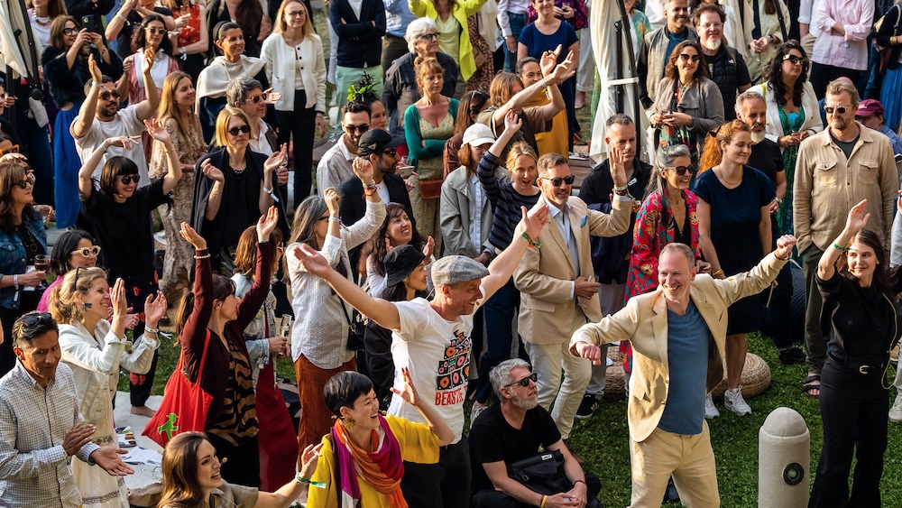 Co-founder Tim Leberecht, lower right in a yellow suit, at the World Beautiful Business Forum in Athens. Leberecht created the House of Beautiful Business to explore ways to add more emotion, adventure, and beauty into modern work. Photo courtesy House of Beautiful Business.